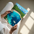 Cala Bassa Travel Poster - A4 print held in hand