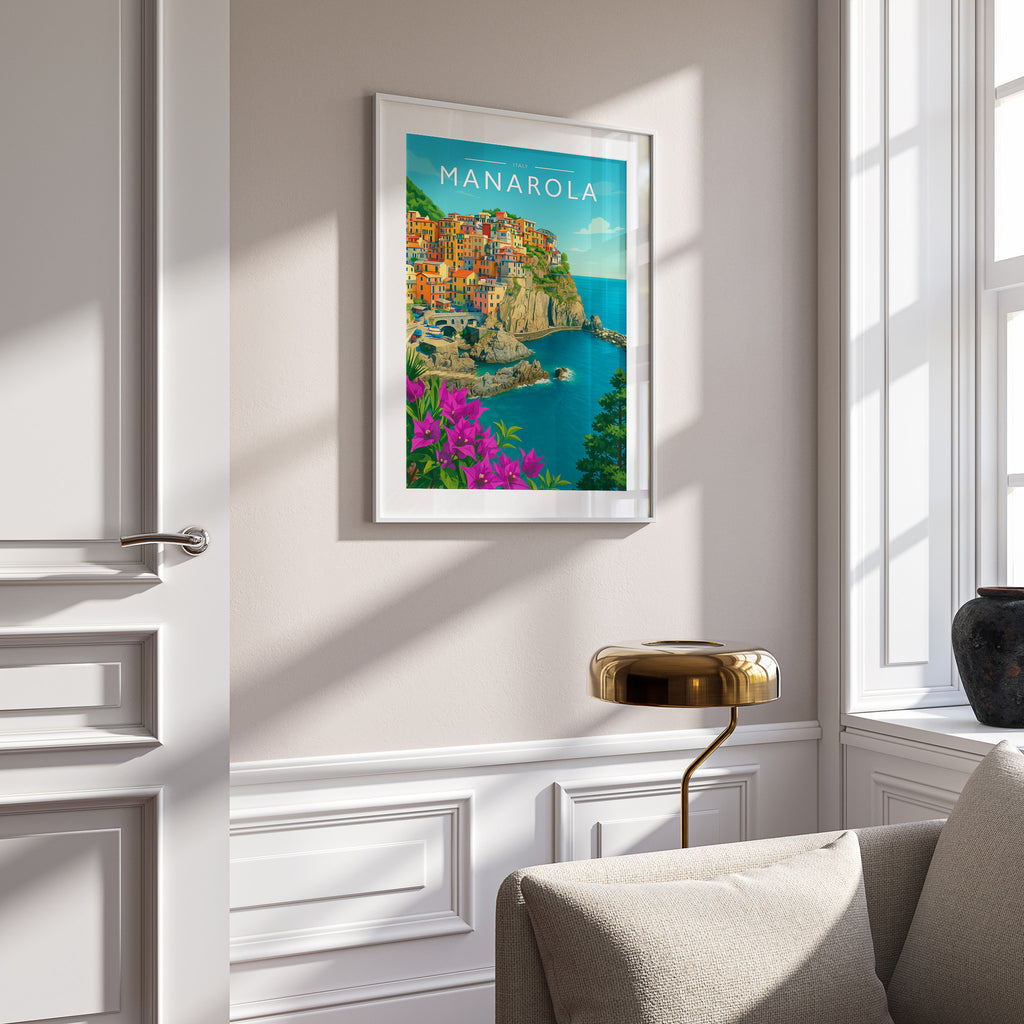 Manarola Travel Poster in a white frame on a panelled wall