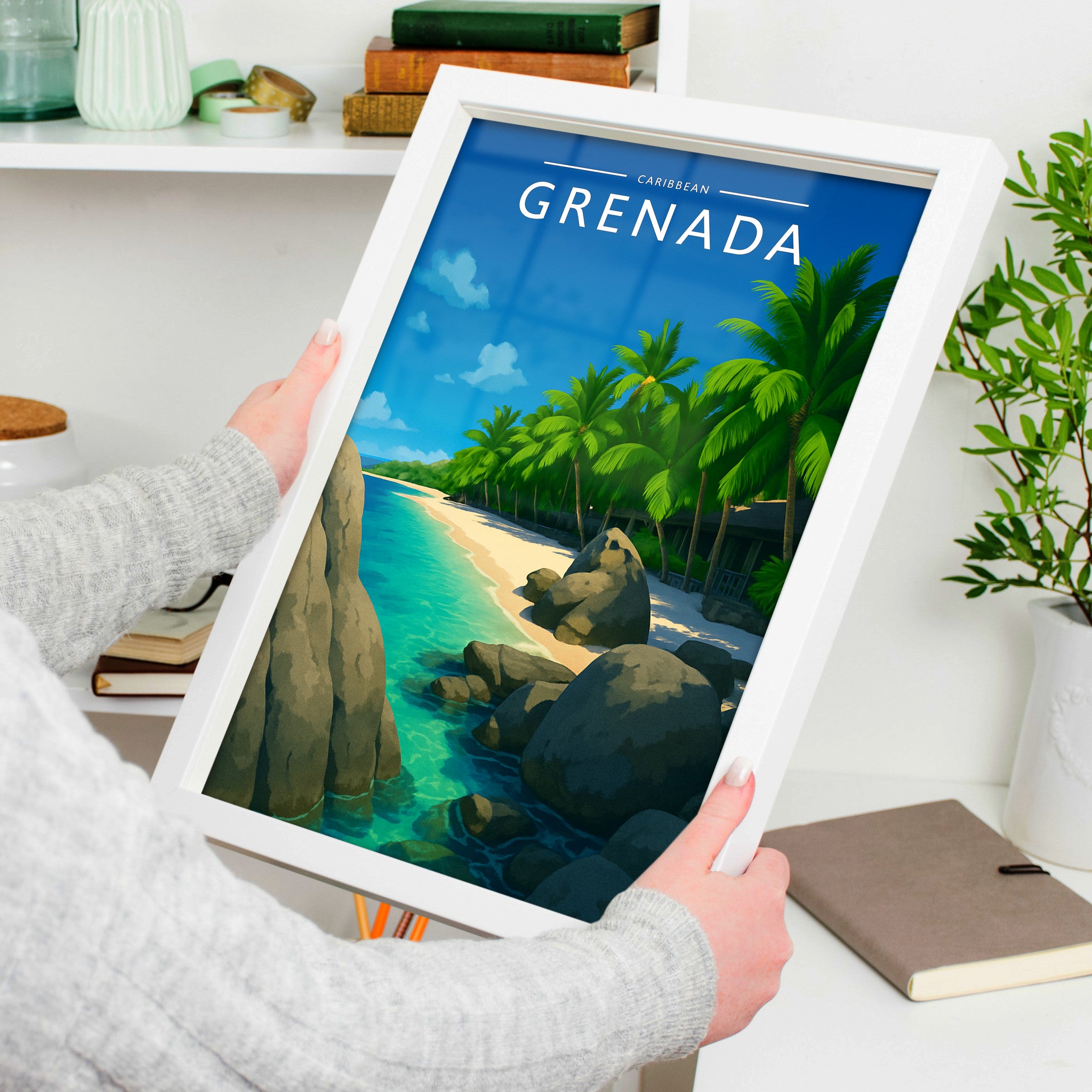 Grenada Travel Poster in a white frame, held to show scale