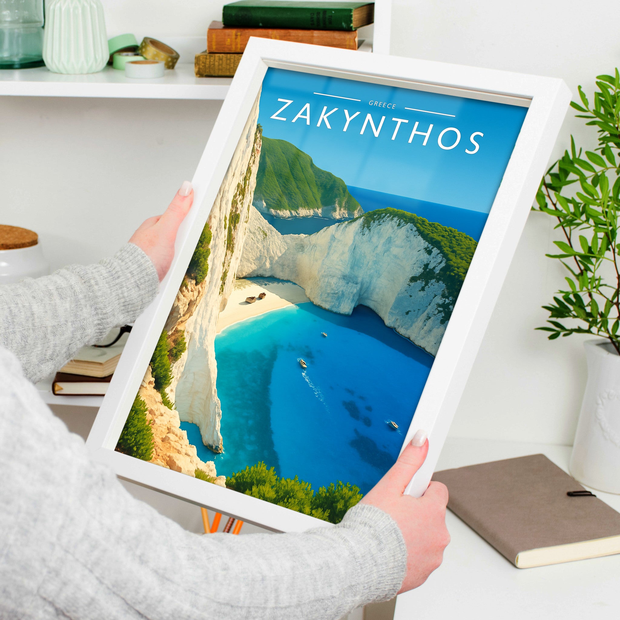 Zakynthos Travel Poster in a white frame, held to show scale