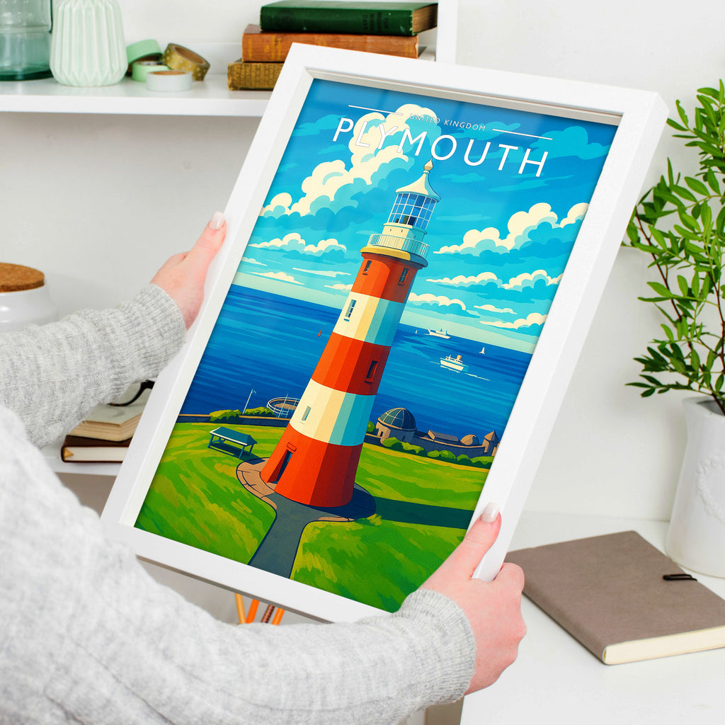 Plymouth Travel Poster in a white frame, held to show scale