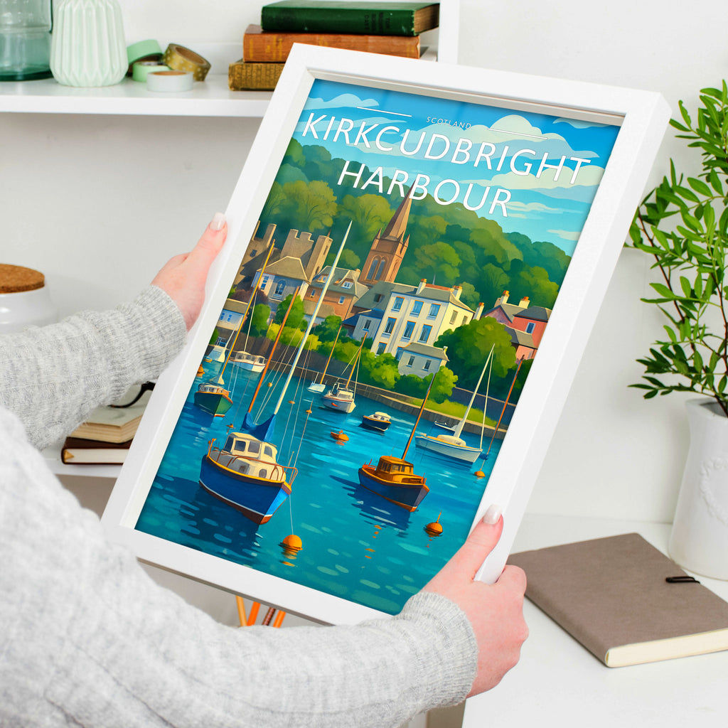 Kirkcudbright Harbour Travel Poster in a white frame, held to show scale