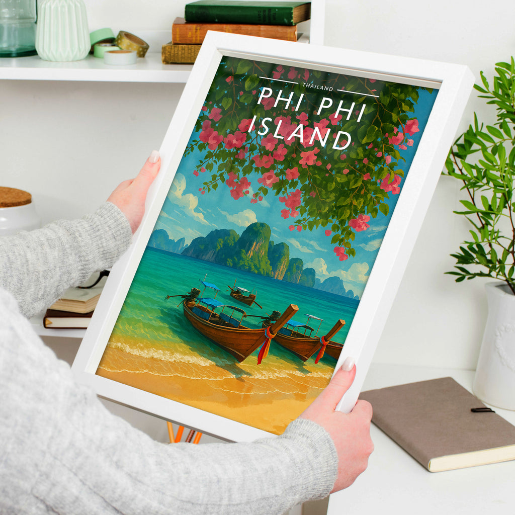 Phi Phi Island Travel Poster in a white frame, held to show scale