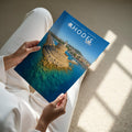Rhodes Travel Poster - A4 print held in hand