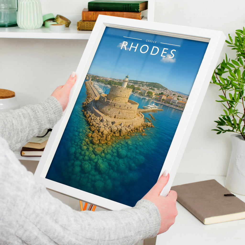 Rhodes Travel Poster in a white frame, held to show scale