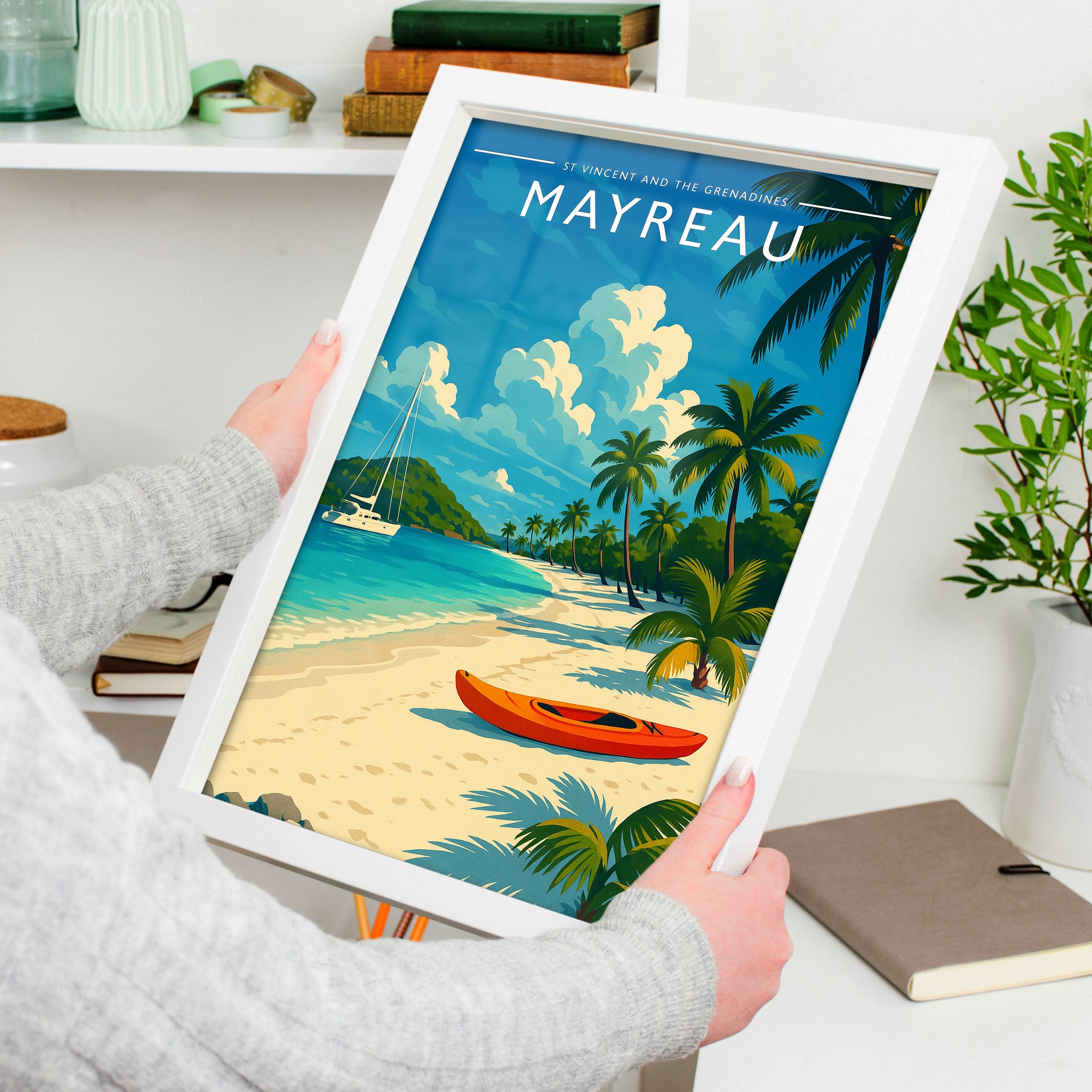 Mayreau #2 Travel Poster in a white frame, held to show scale