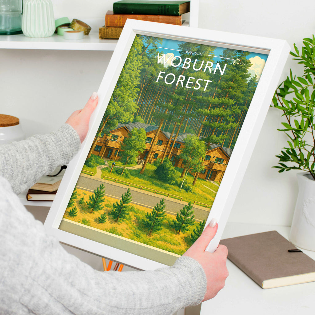 Woburn Travel Poster in a white frame, held to show scale