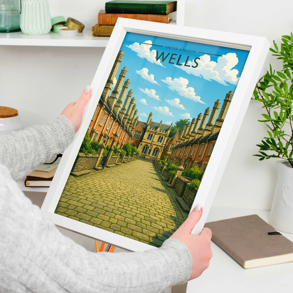 Wells Travel Poster in a white frame, held to show scale