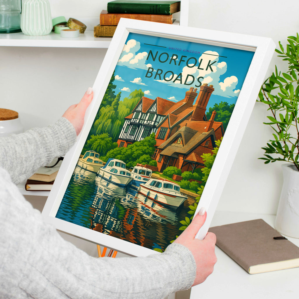 Norfolk Broads Travel Poster in a white frame, held to show scale