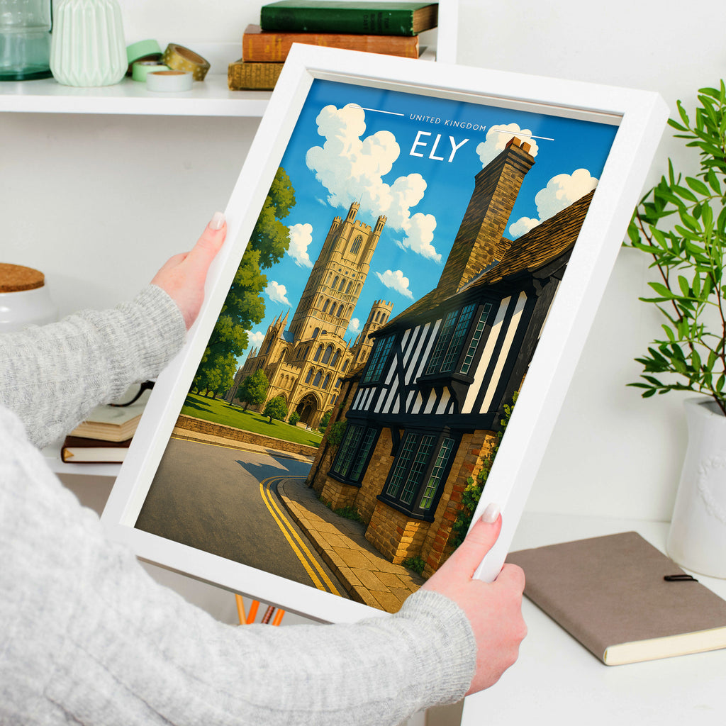 Ely Travel Poster in a white frame, held to show scale