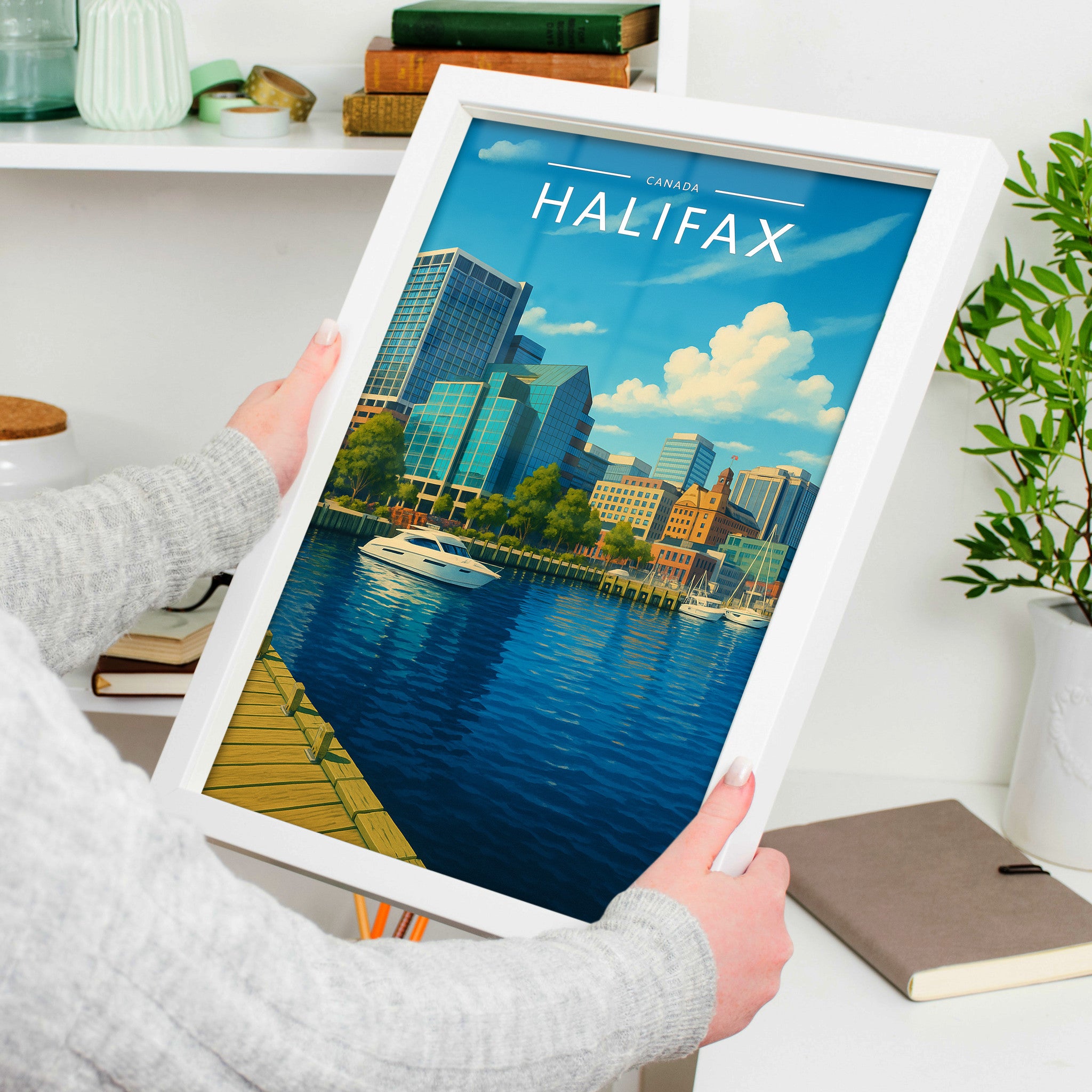 Halifax Travel Poster in a white frame, held to show scale