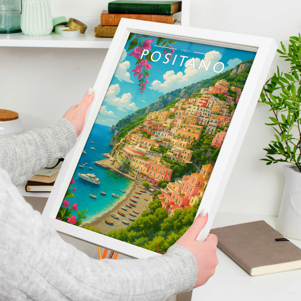 Positano #2 Travel Poster in a white frame, held to show scale