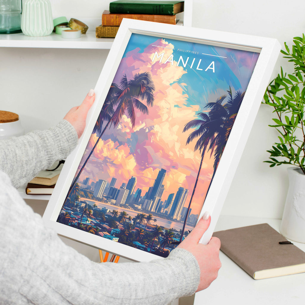 Manila Travel Poster in a white frame, held to show scale