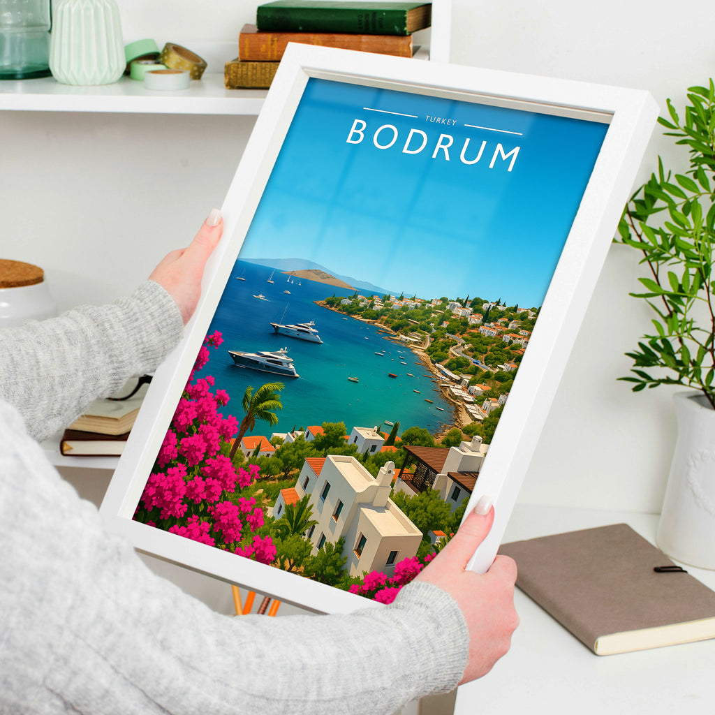 Bodrum Travel Poster in a white frame, held to show scale