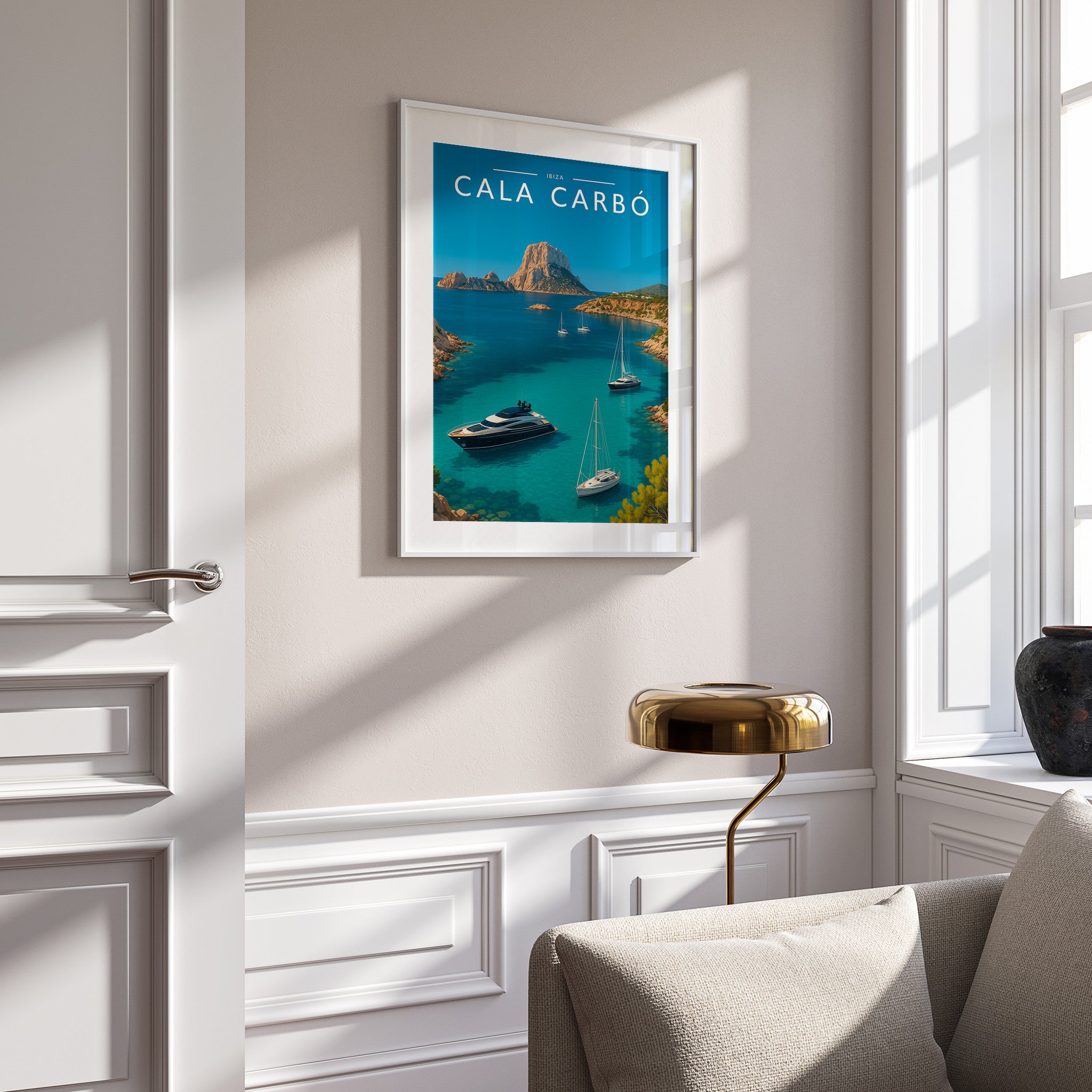 Cala Carbó Travel Poster in a white frame on a panelled wall