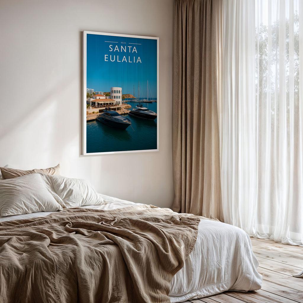 Santa Eulalia Travel Poster framed on a bedroom wall