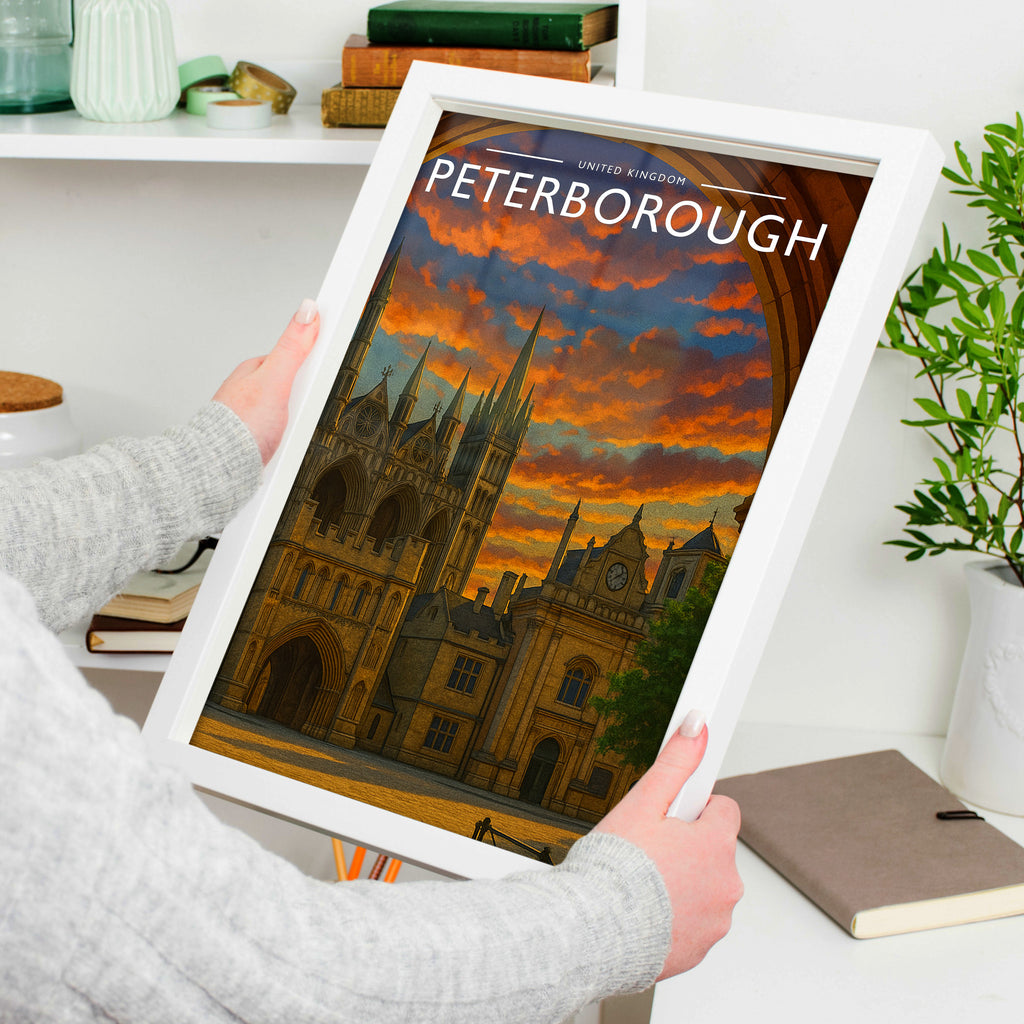 Peterborough Travel Poster in a white frame, held to show scale