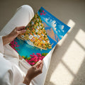 Symi Travel Poster - A4 print held in hand