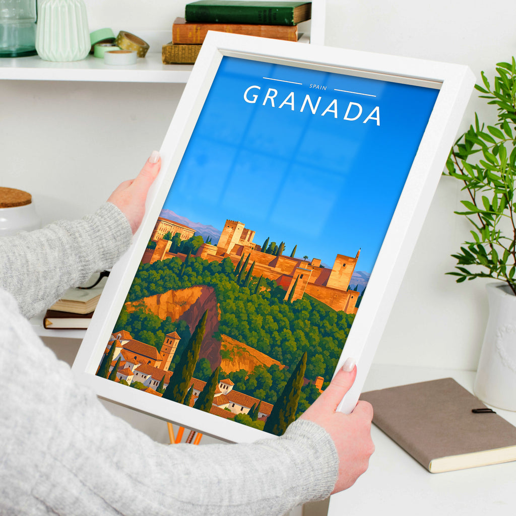 Granada Travel Poster in a white frame, held to show scale