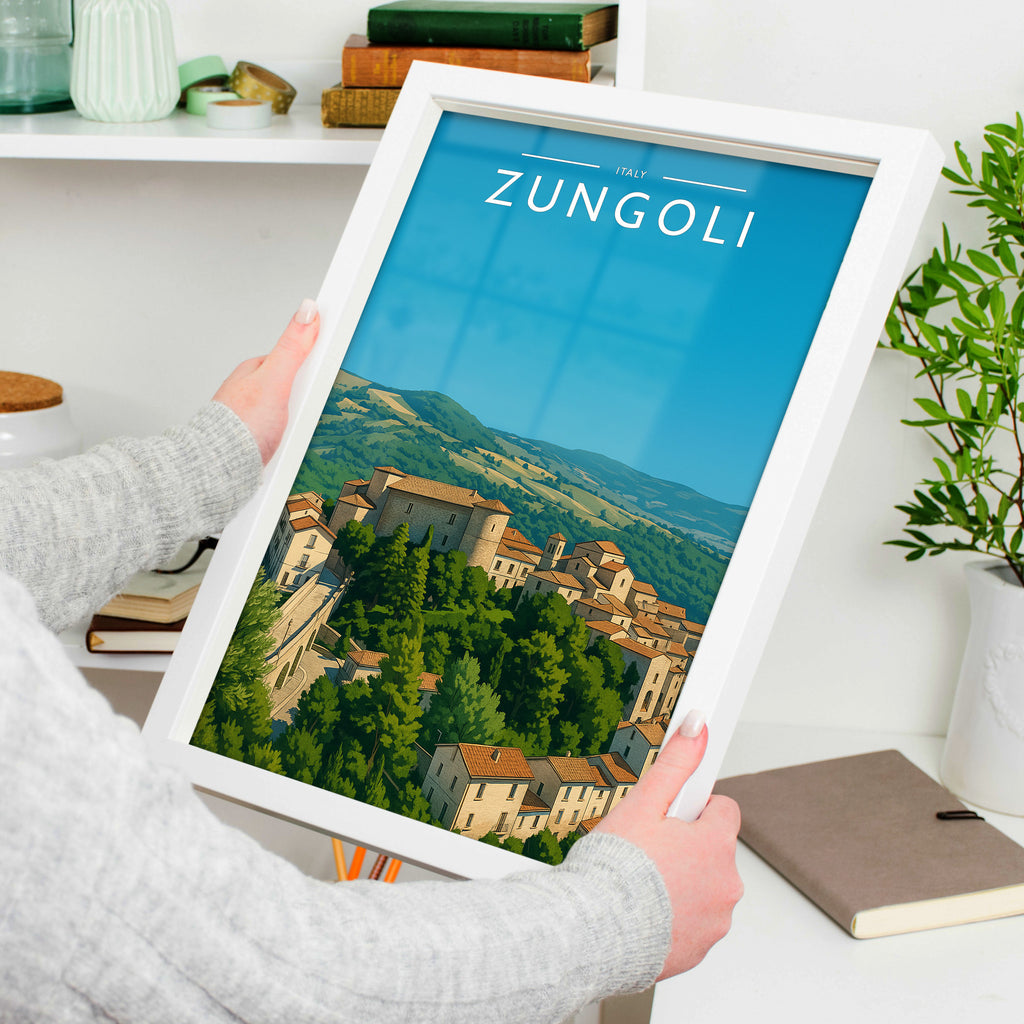 Zungoli Travel Poster in a white frame, held to show scale