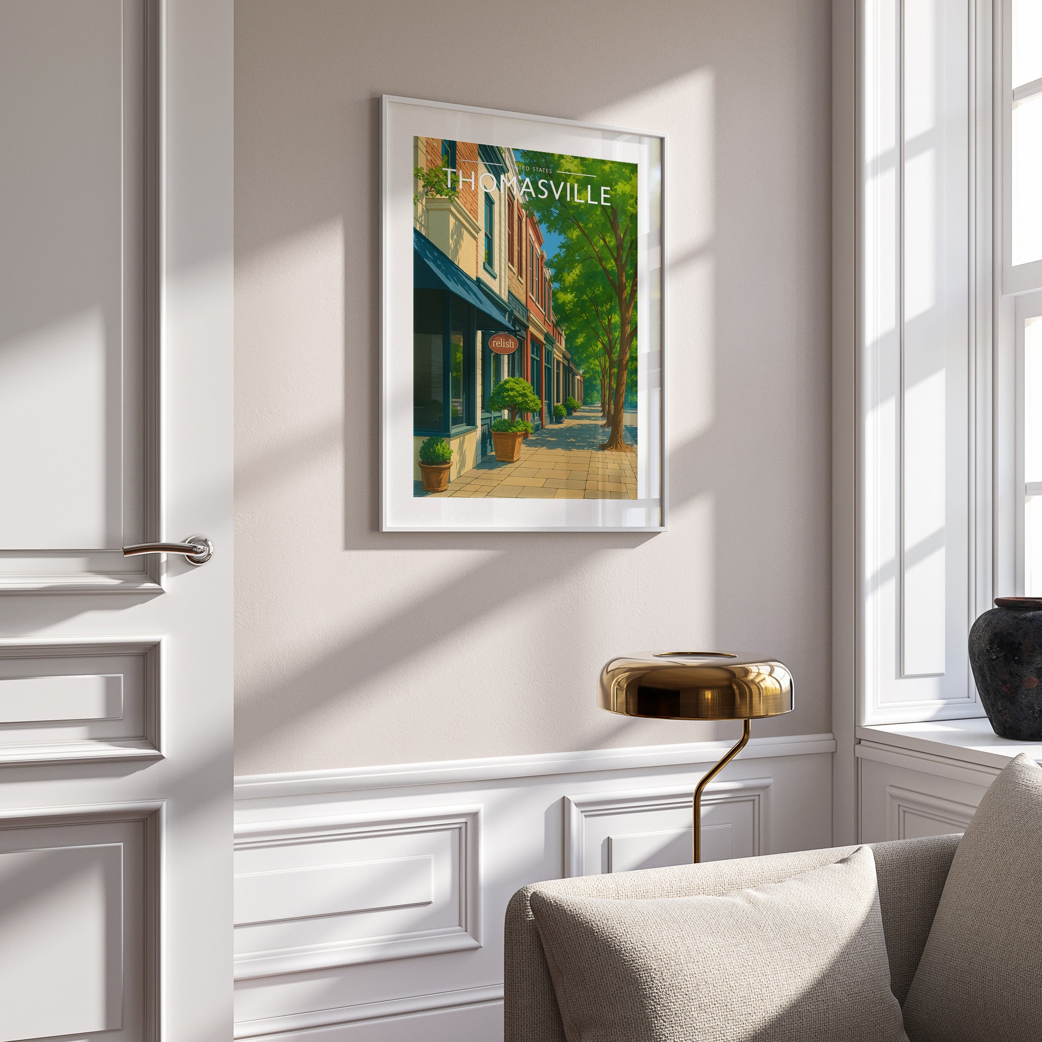 Thomasville Travel Poster in a white frame on a panelled wall
