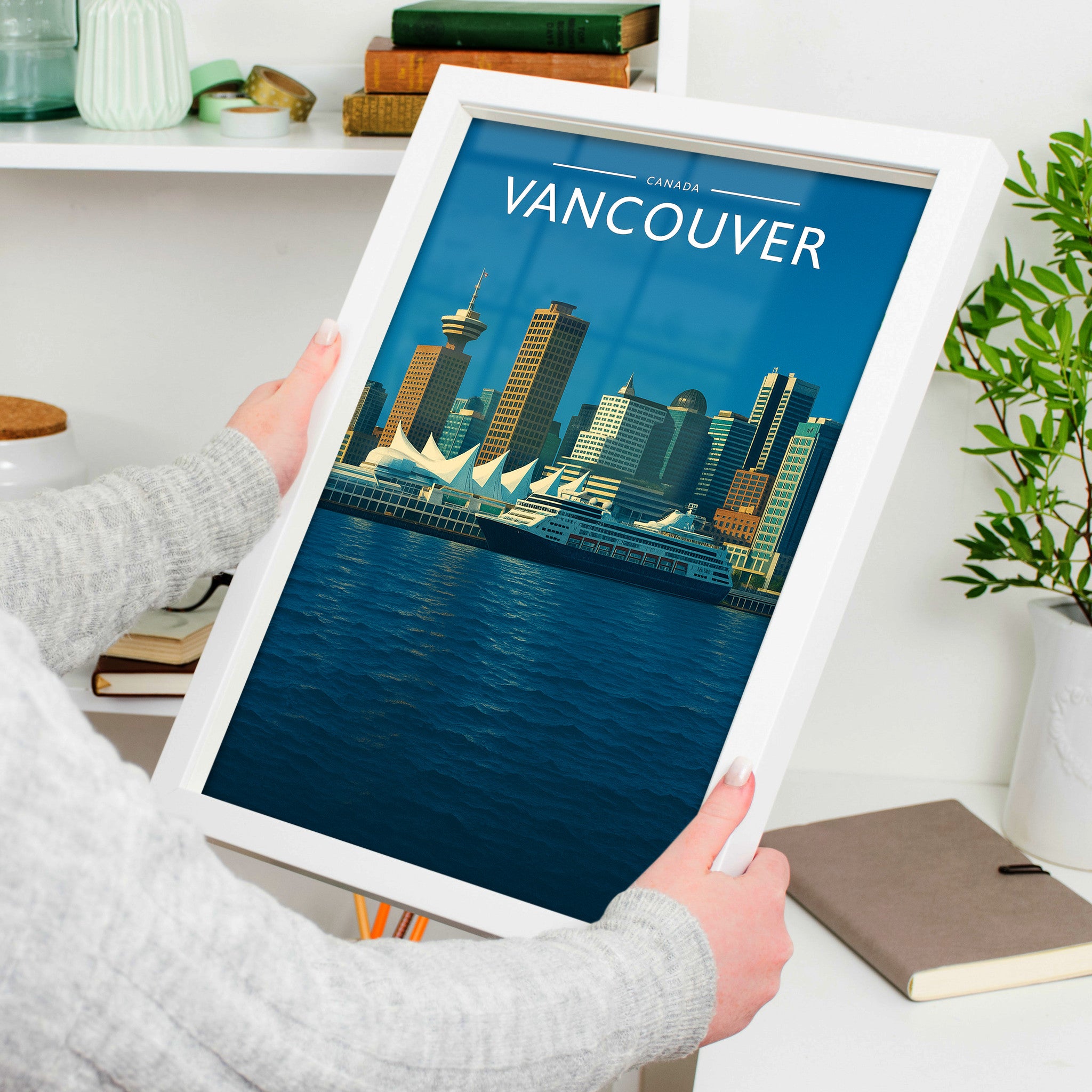 Vancouver #2 Travel Poster in a white frame, held to show scale