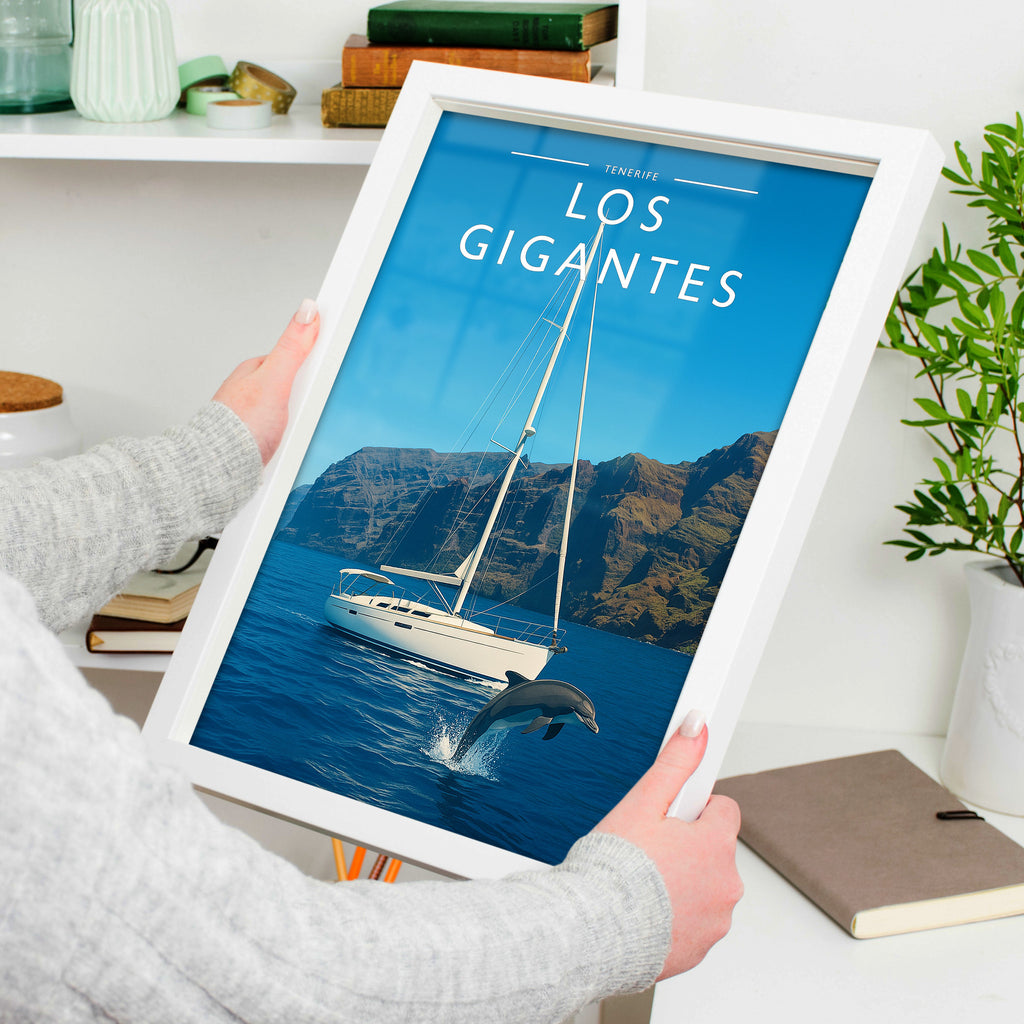 Los Gigantes Travel Poster in a white frame, held to show scale