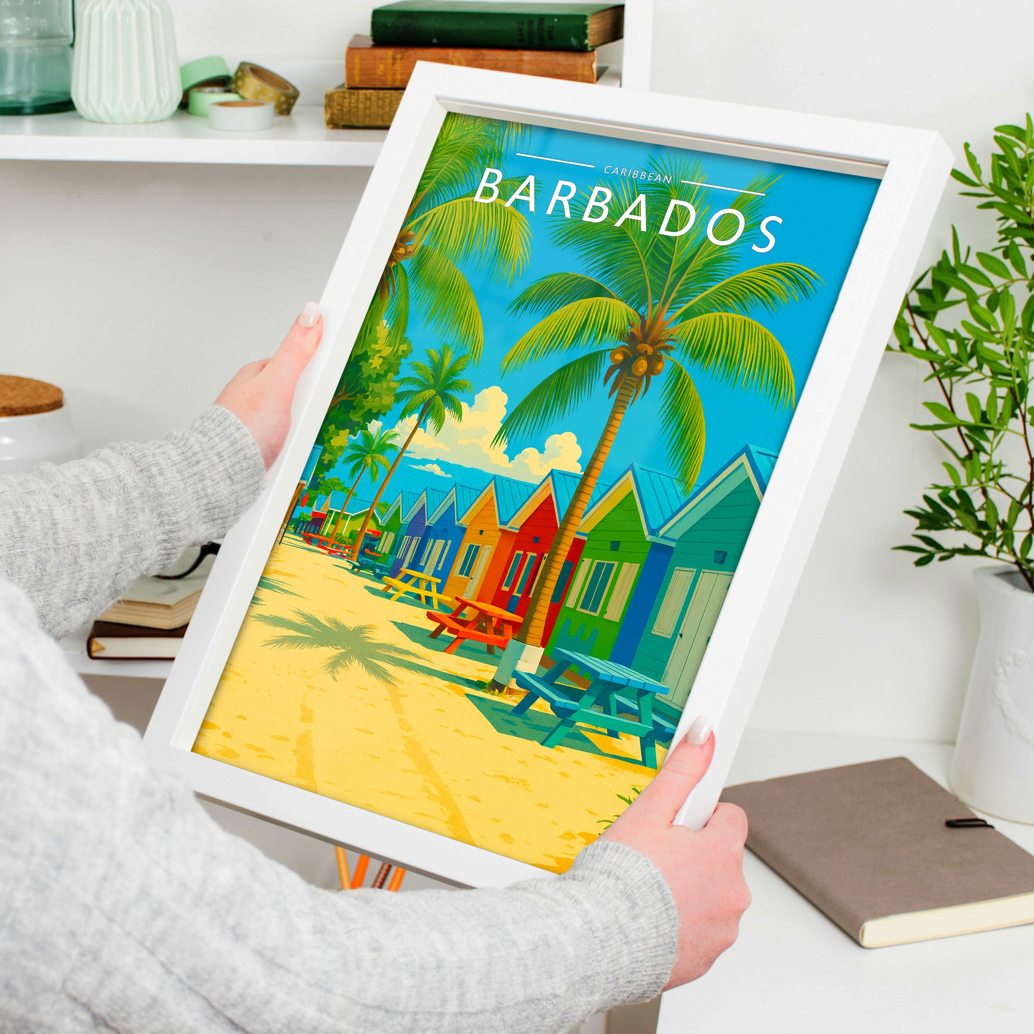 Barbados Travel Poster in a white frame, held to show scale
