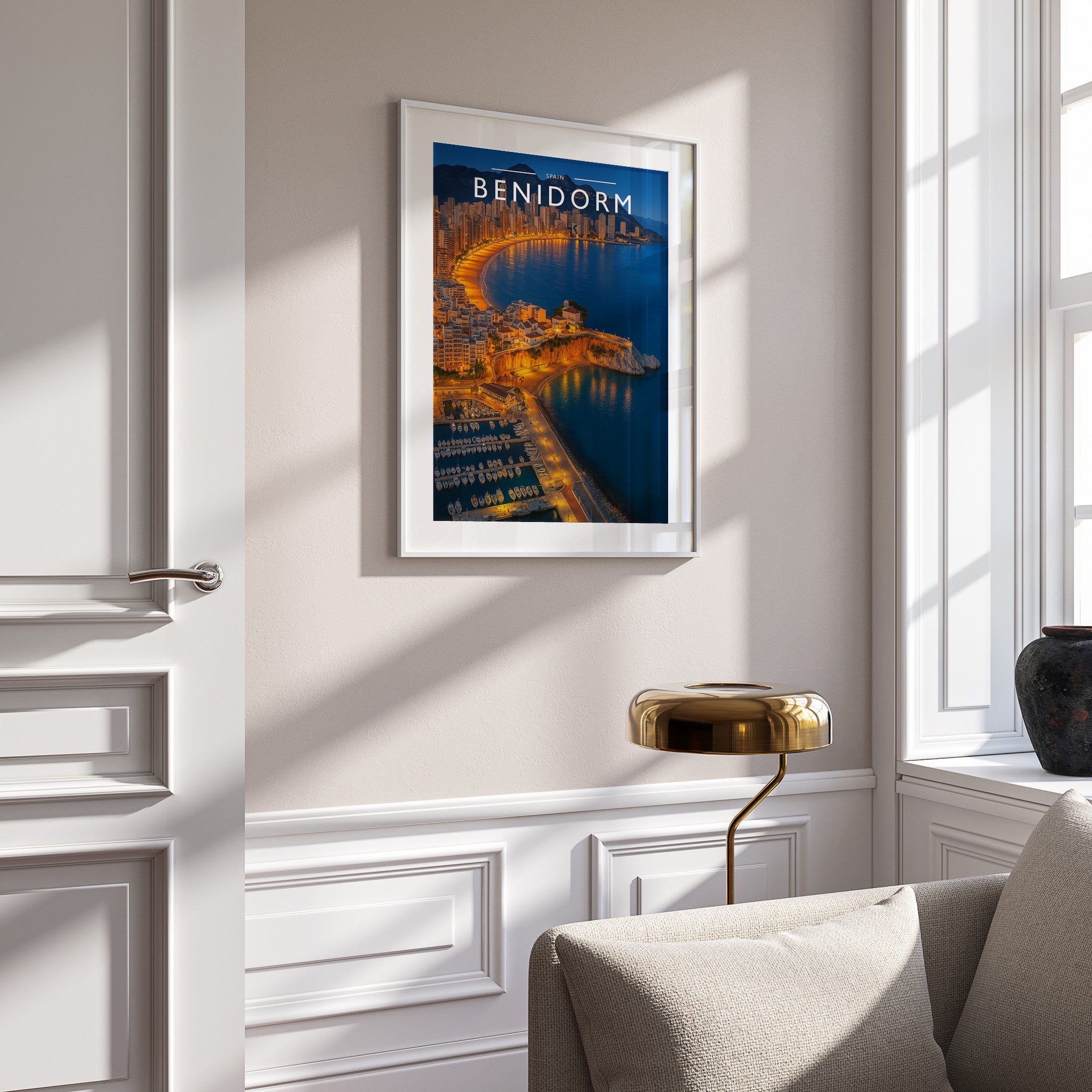 Benidorm Travel Poster in a white frame on a panelled wall