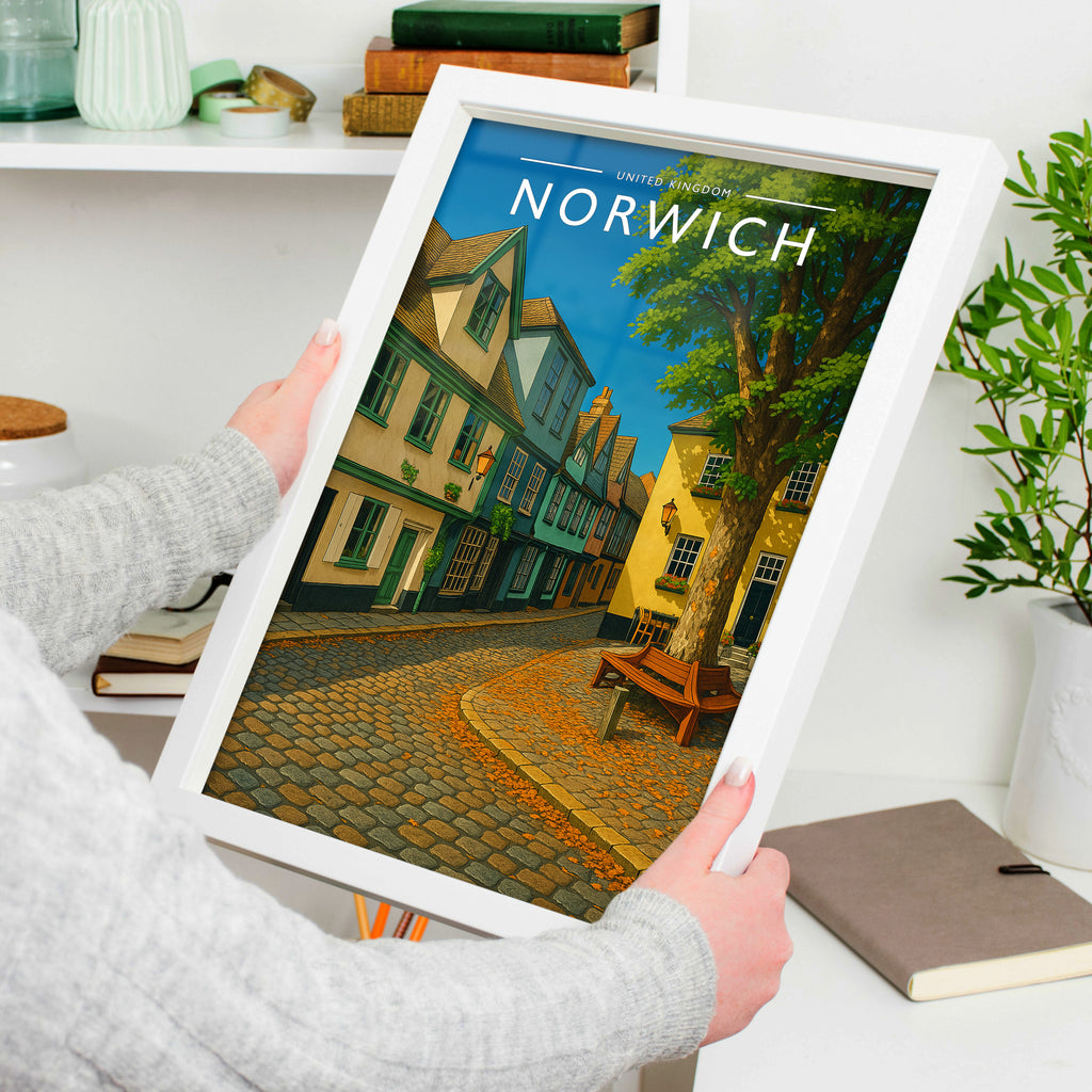 Norwich #3 Travel Poster in a white frame, held to show scale