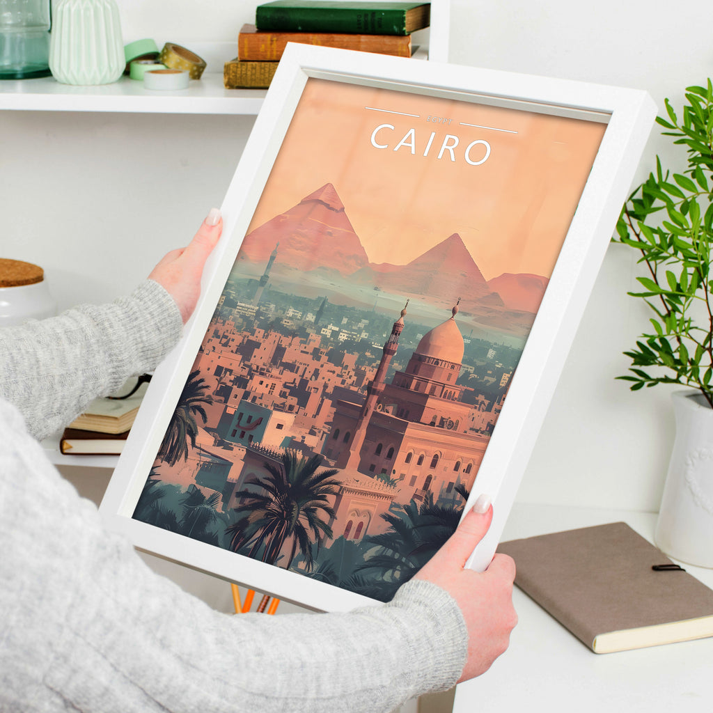 Cairo Travel Poster in a white frame, held to show scale
