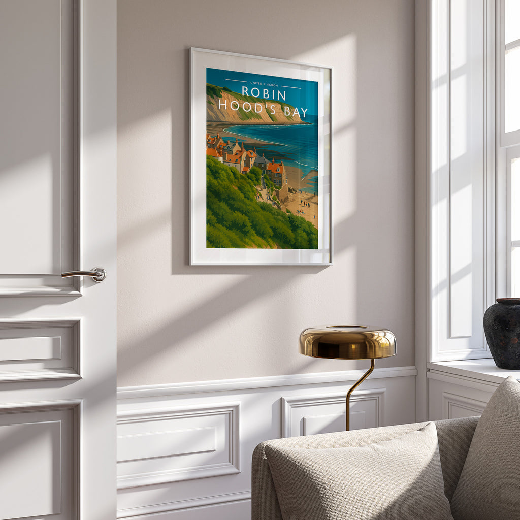 Robin Hood’s Bay Travel Poster in a white frame on a panelled wall