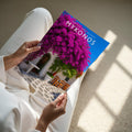 Mykonos Travel Poster - A4 print held in hand