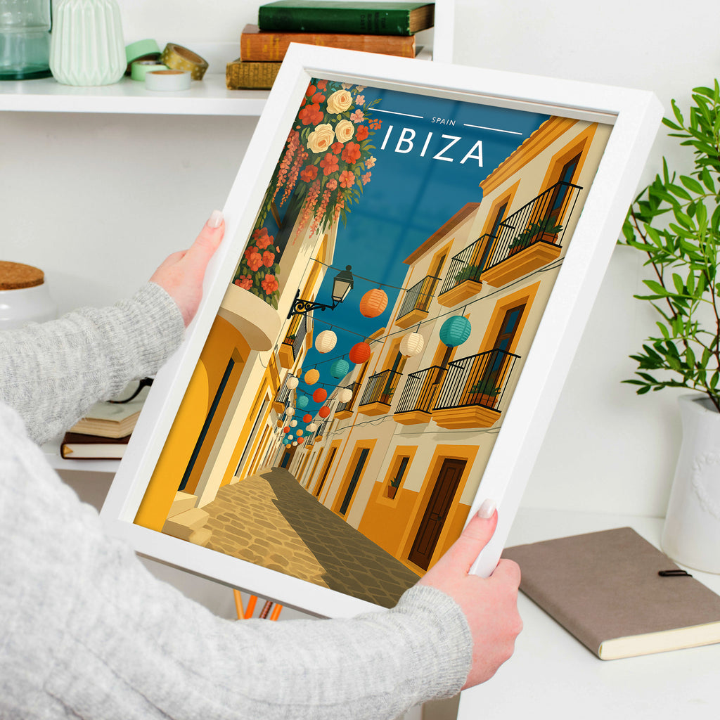 Ibiza #9 Travel Poster in a white frame, held to show scale