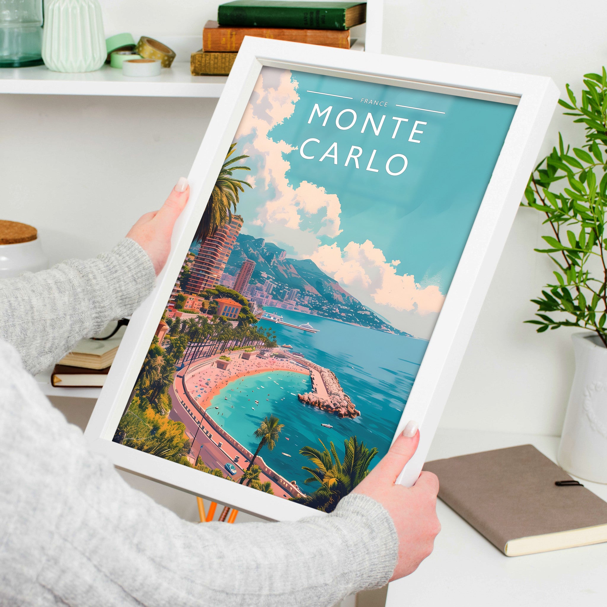Monte Carlo Travel Poster in a white frame, held to show scale