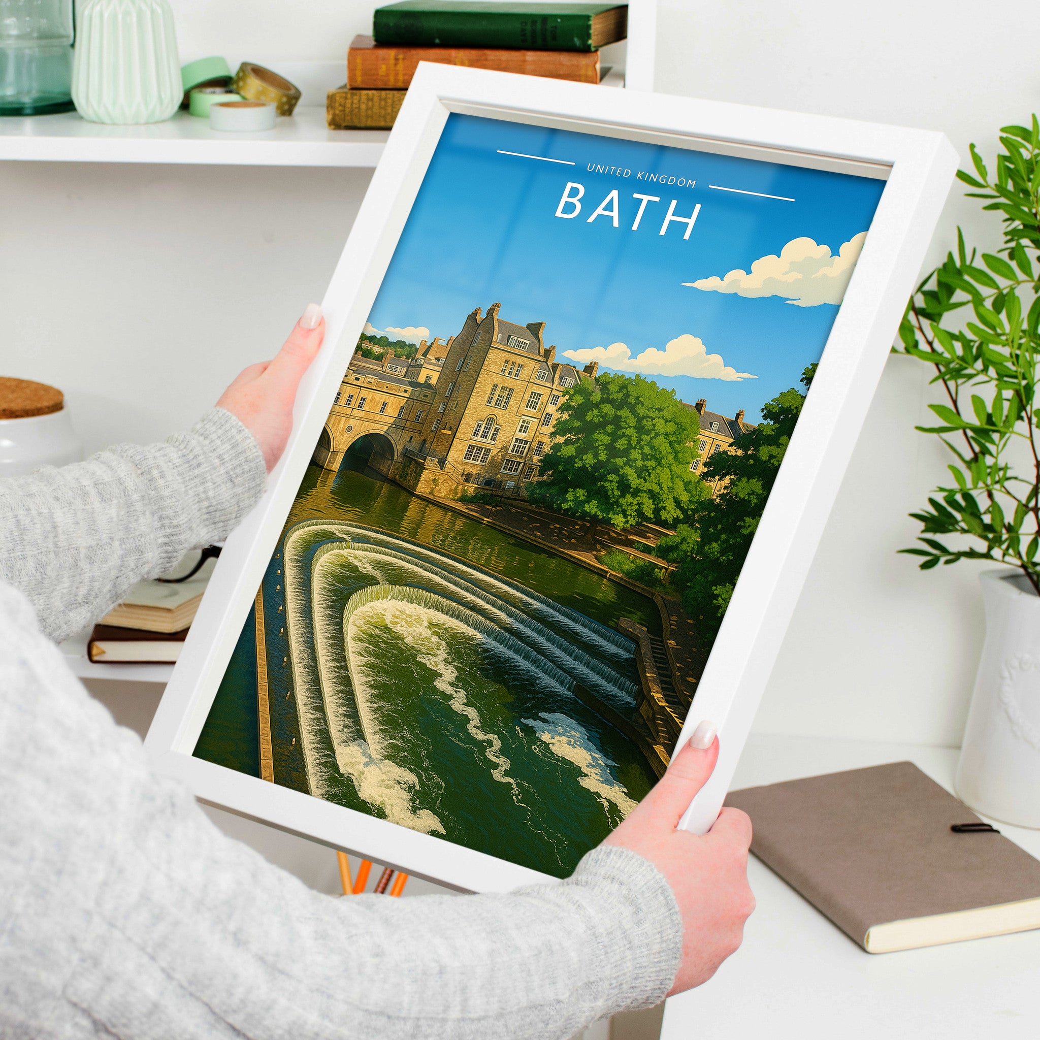 Bath #2 Travel Poster in a white frame, held to show scale