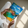 Kefalonia Travel Poster - A4 print held in hand