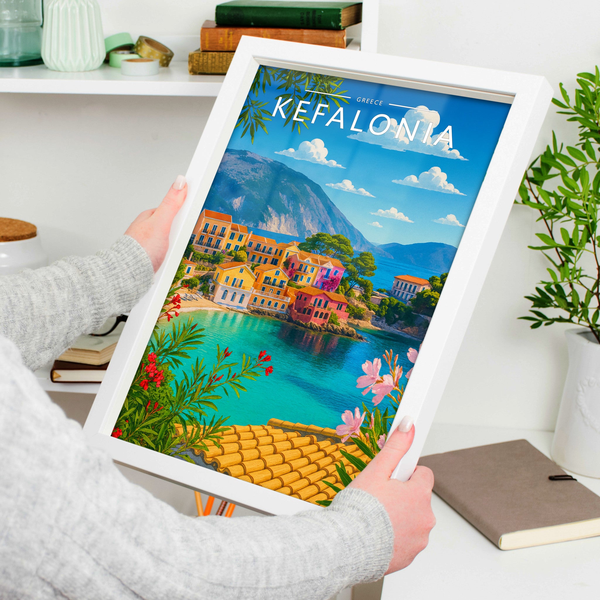 Kefalonia Travel Poster in a white frame, held to show scale