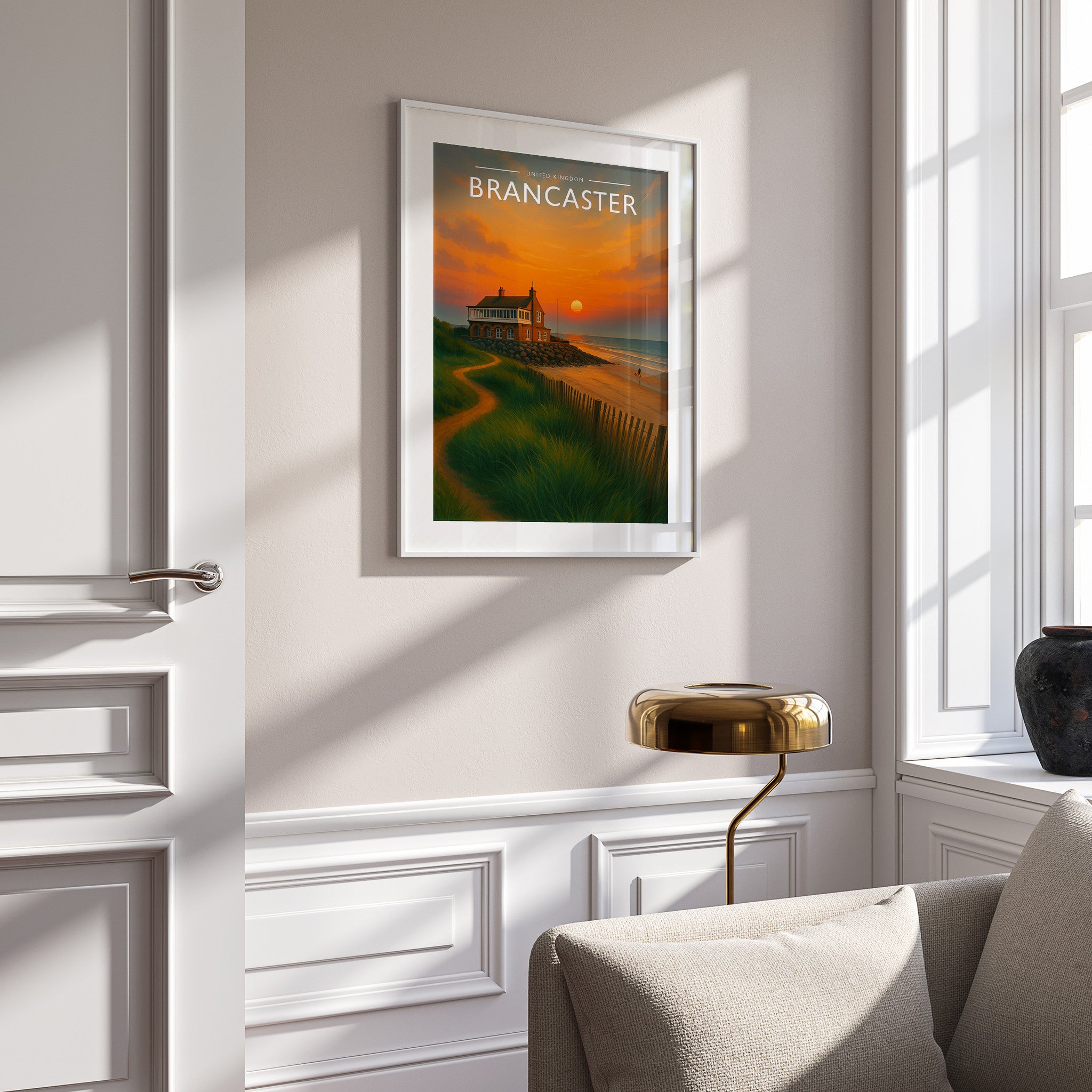 Brancaster Travel Poster in a white frame on a panelled wall