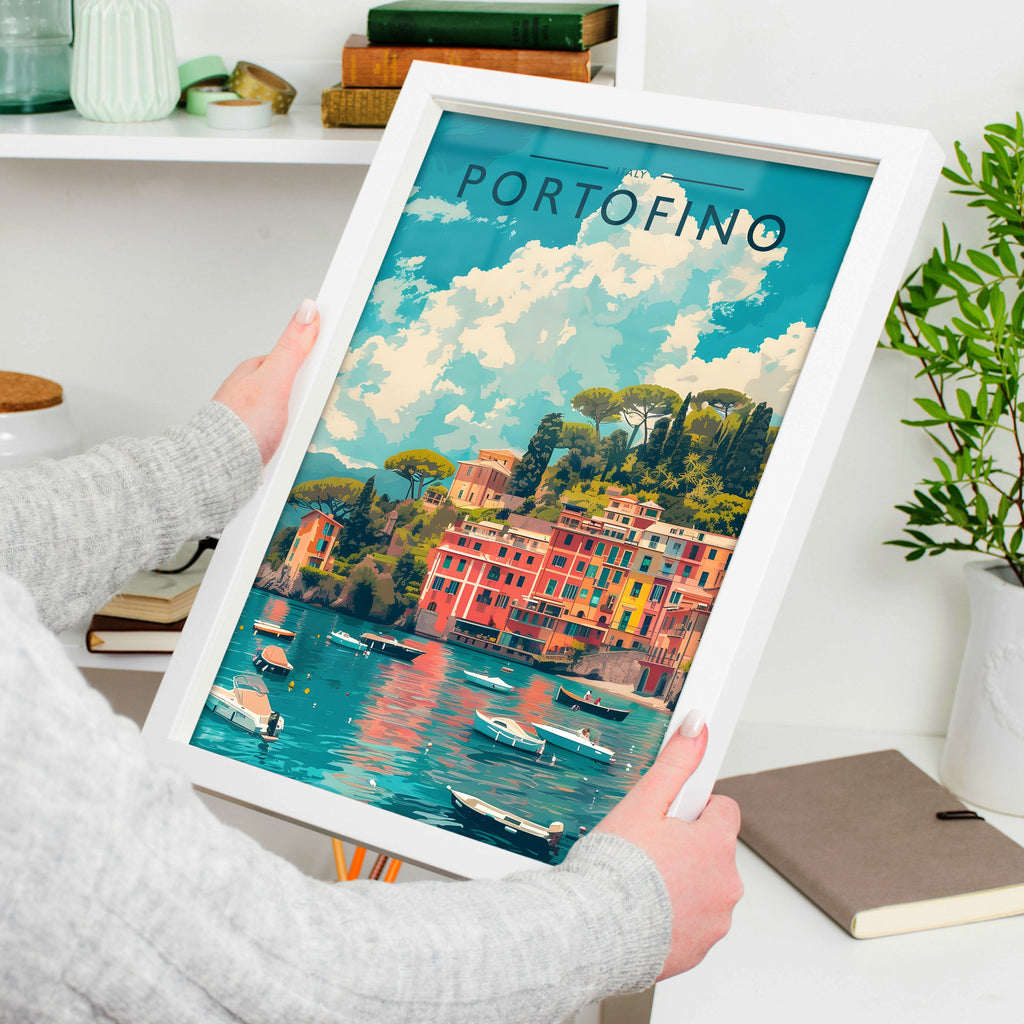 Portofino Travel Poster in a white frame, held to show scale
