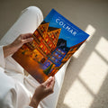 Colmar Travel Poster - A4 print held in hand
