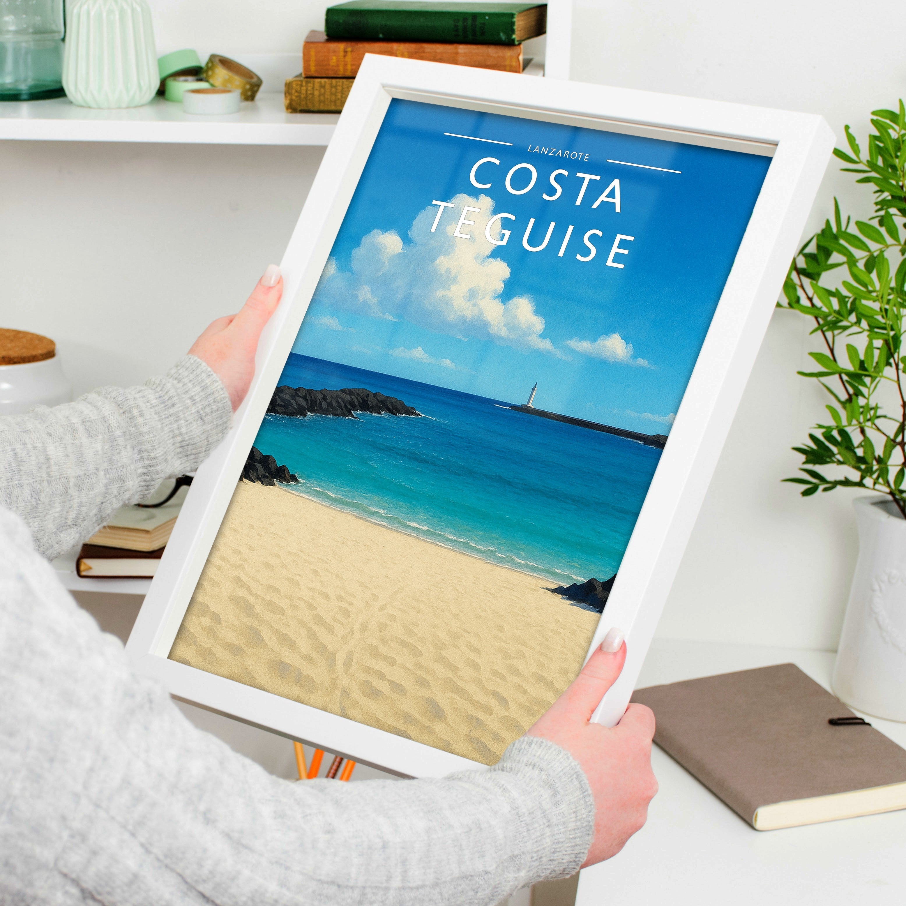 Costa Teguise Travel Poster held in a white frame