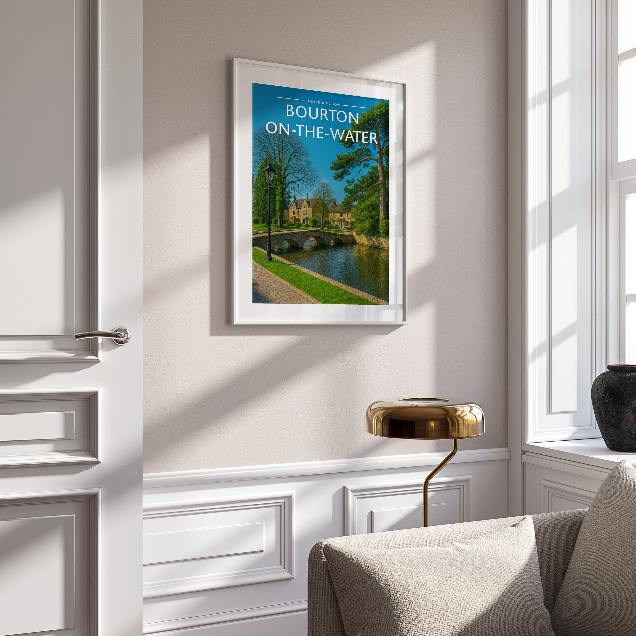 Bourton-on-the-Water Travel Poster in a white frame on a panelled wall