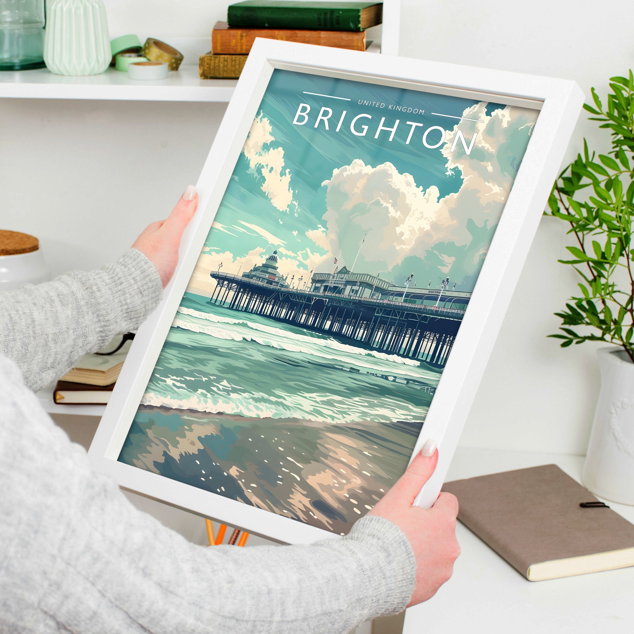 Brighton Travel Poster in a white frame, held to show scale