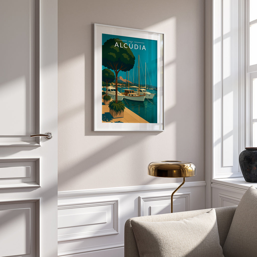 Alcúdia Travel Poster in a white frame on a panelled wall