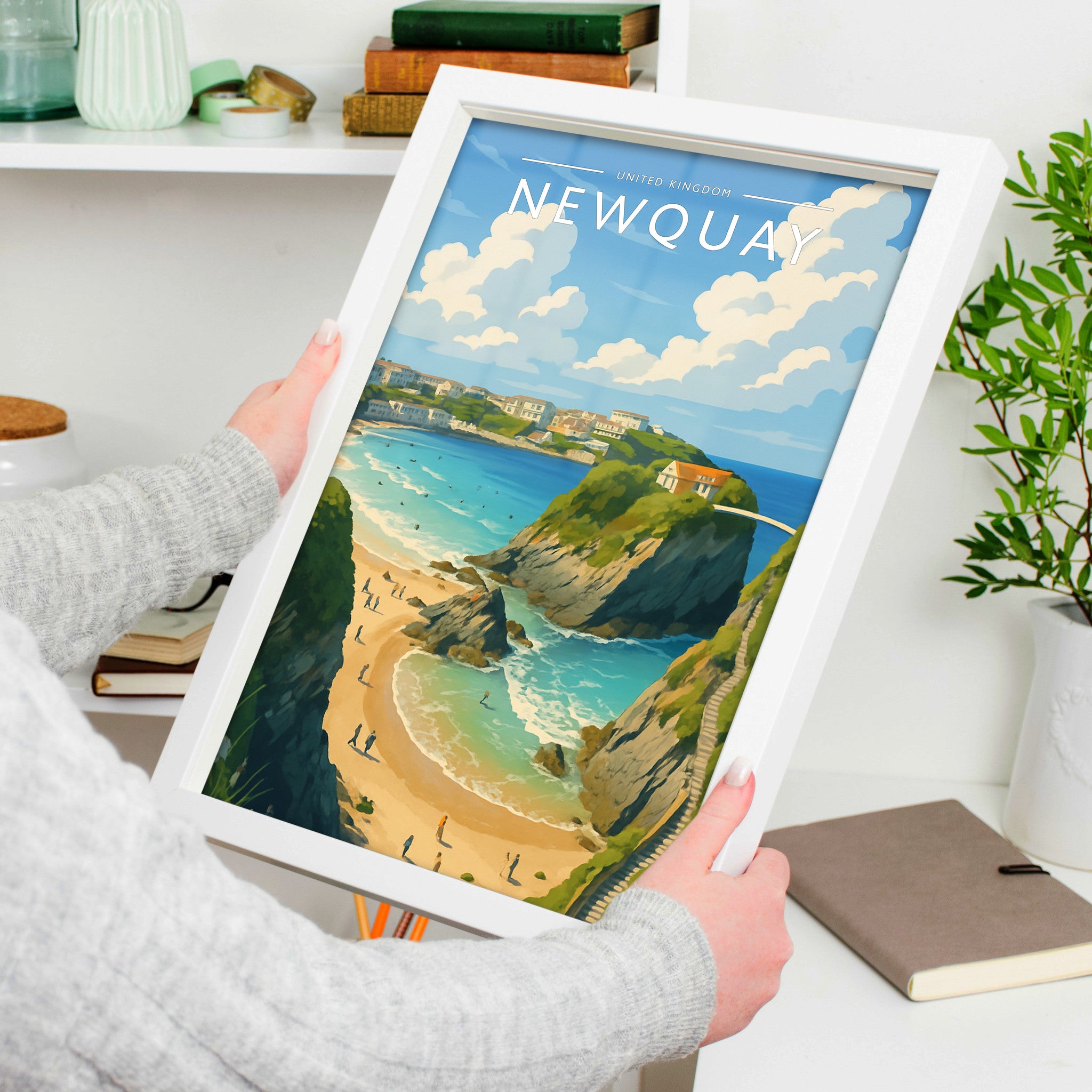 Newquay #2 Travel Poster in a white frame, held to show scale