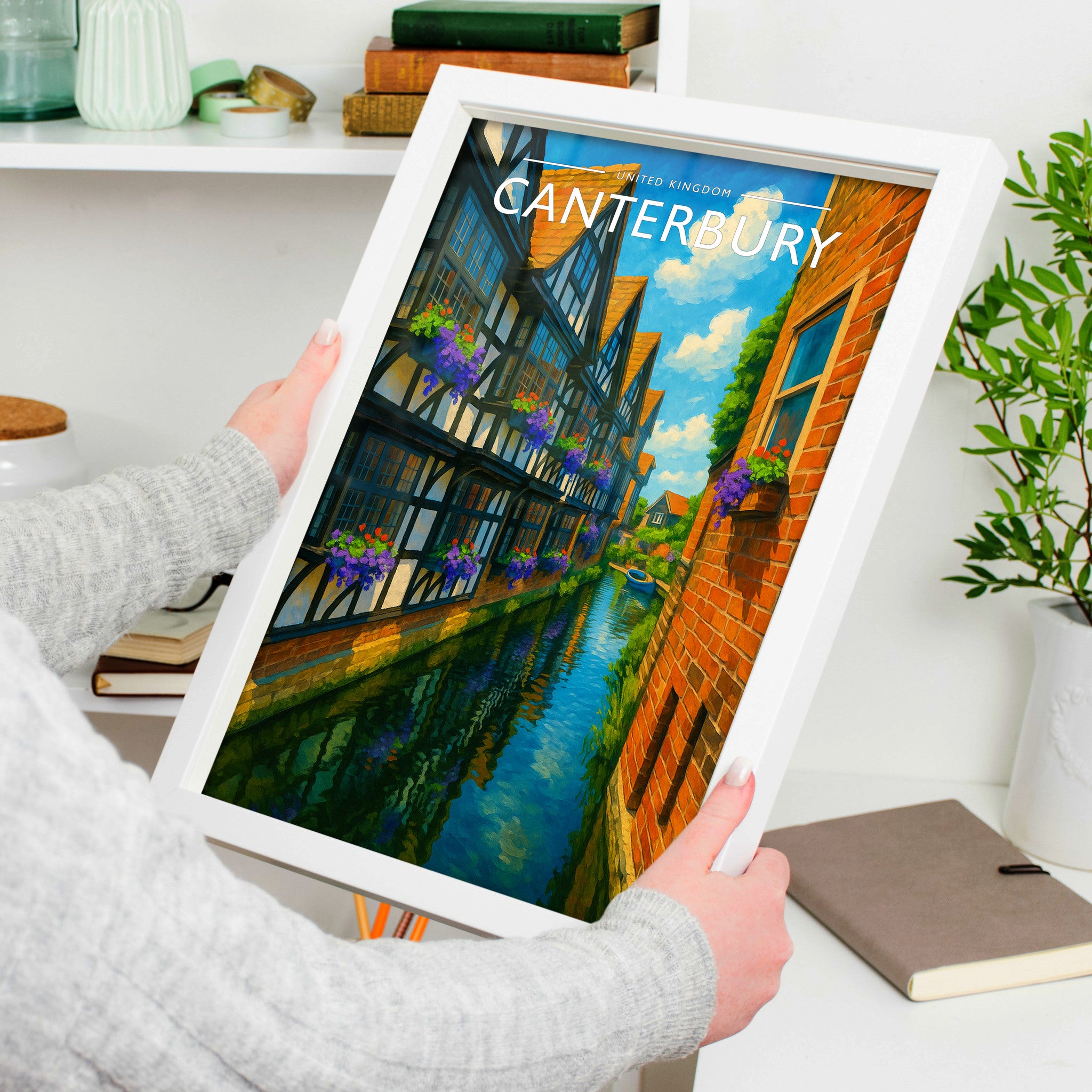 Canterbury Travel Poster in a white frame, held to show scale