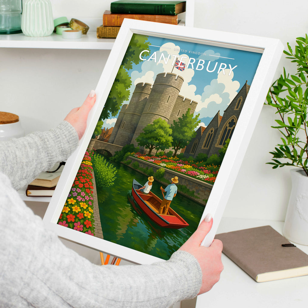 Canterbury #2 Travel Poster in a white frame, held to show scale