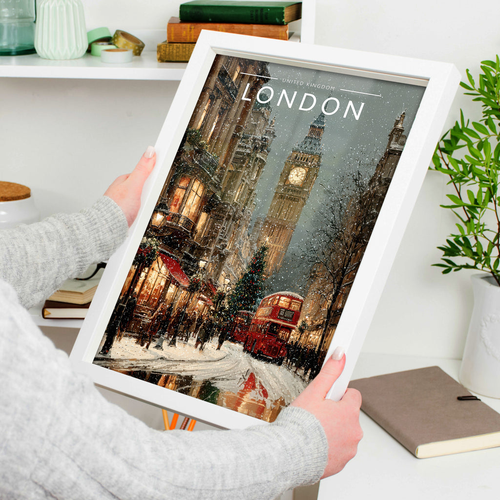 London Travel Poster in a white frame, held to show scale