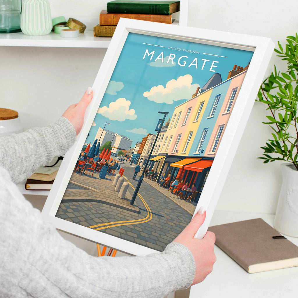 Margate Travel Poster in a white frame, held to show scale